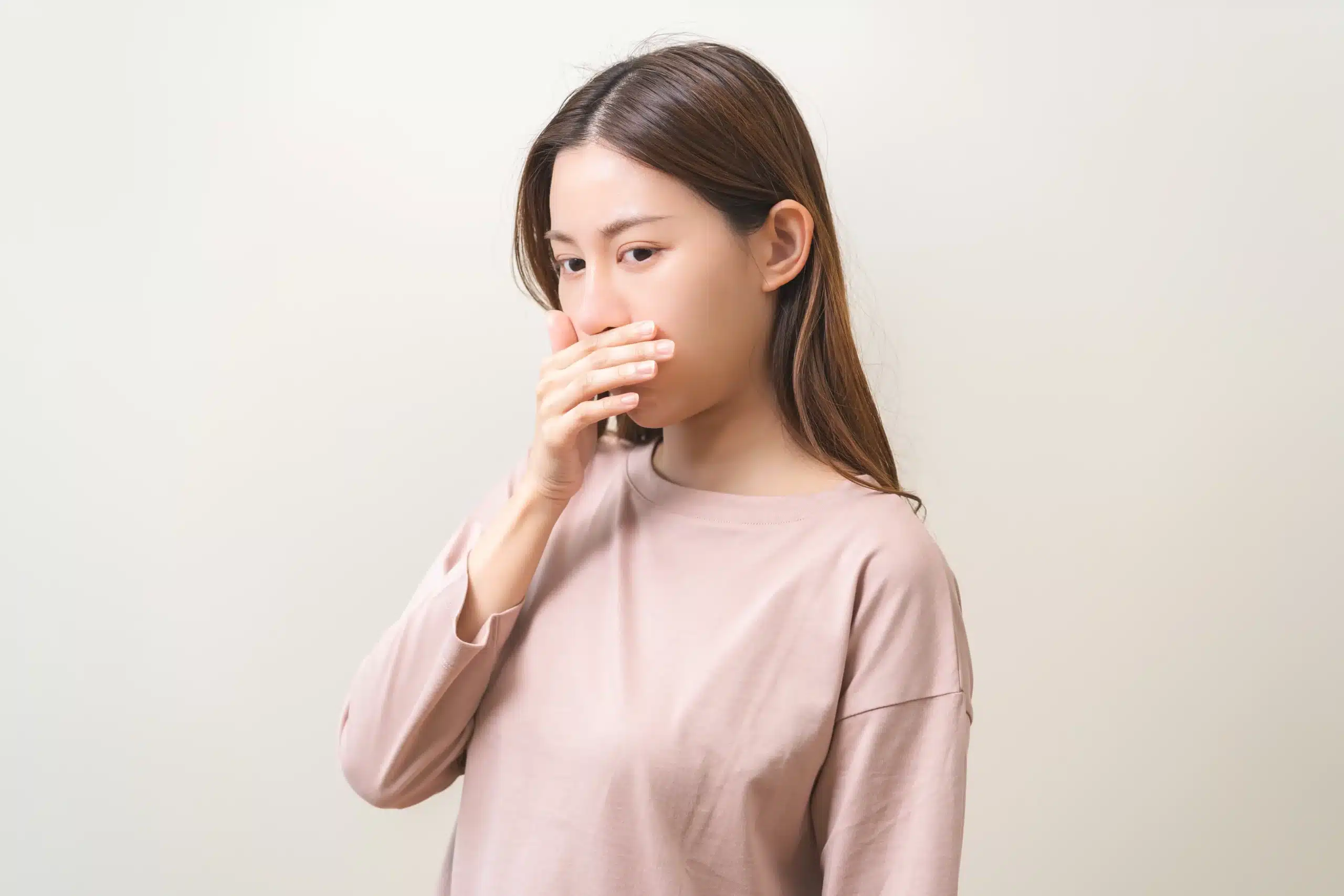 girl availing dental treatment to eliminate bad breath and restore oral health