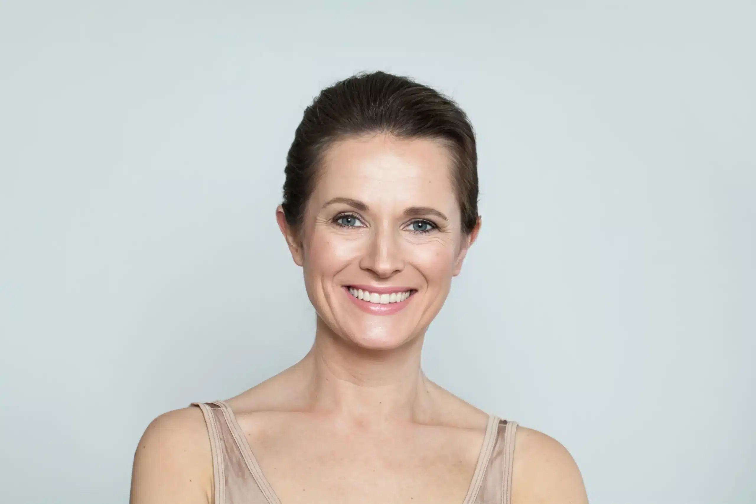 woman is happy to save her tooth with root canal treatment in Silver Spring, MD